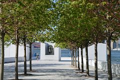 32 New York City Roosevelt Island Franklin D Roosevelt Four Freedoms Park Trees Frame The Path To The Roosevelt Statue.jpg